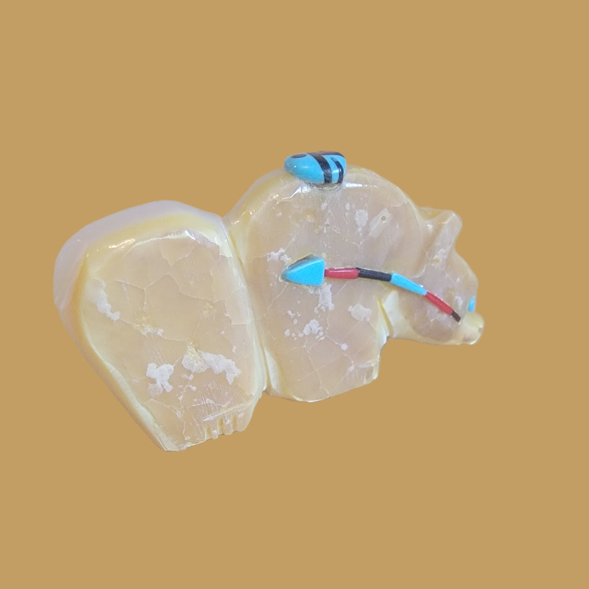 Mother of Pearl/ Gold Lip Grizzly Bear w/Heartline and Zuni Sun Zuni Fetish