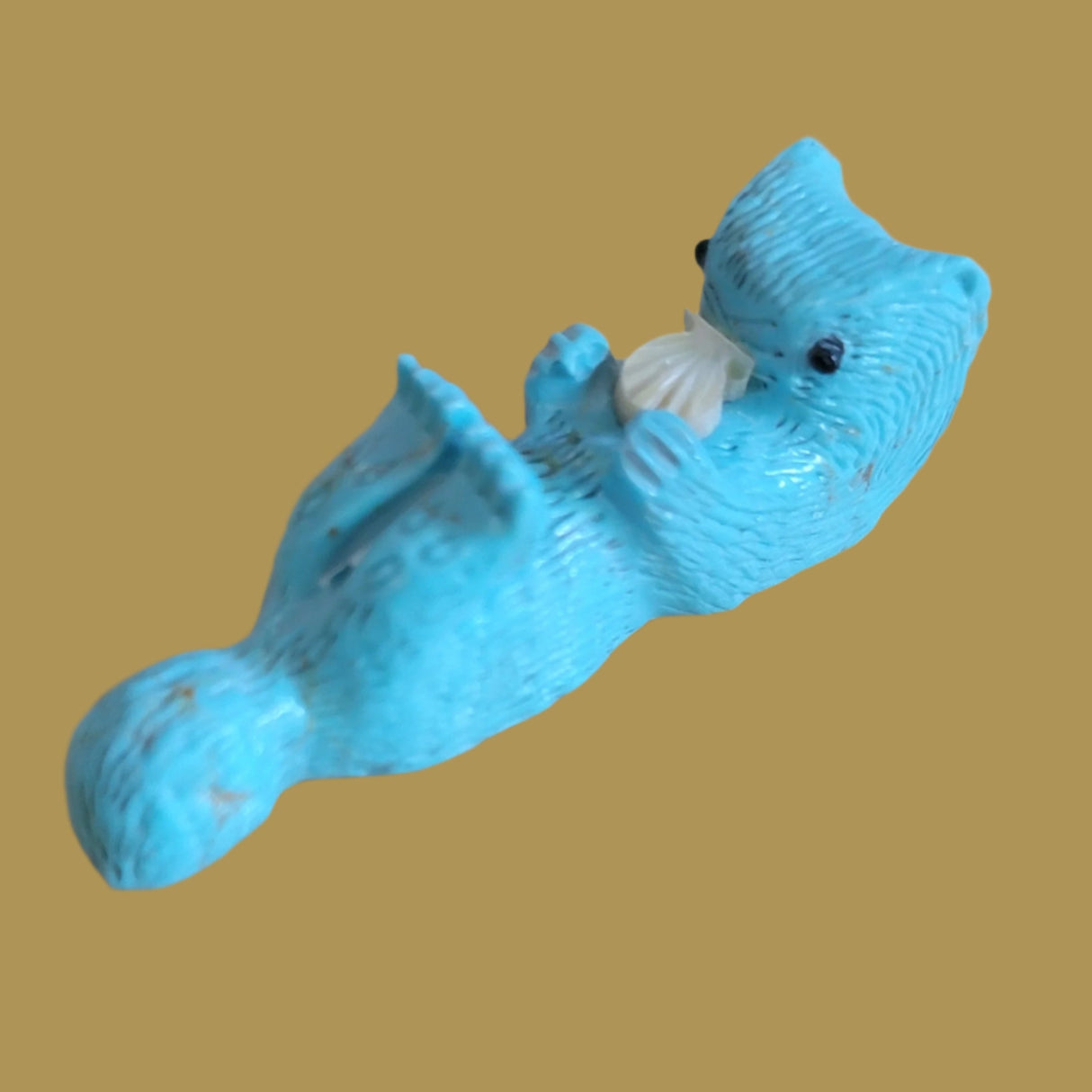 Laid Back Turquoise Otter w/Shell Zuni Fetish
